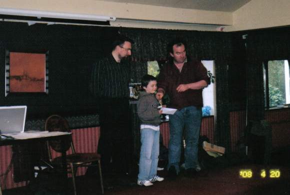 
John Bourke receiving joint 3rd U-1400 prize.
